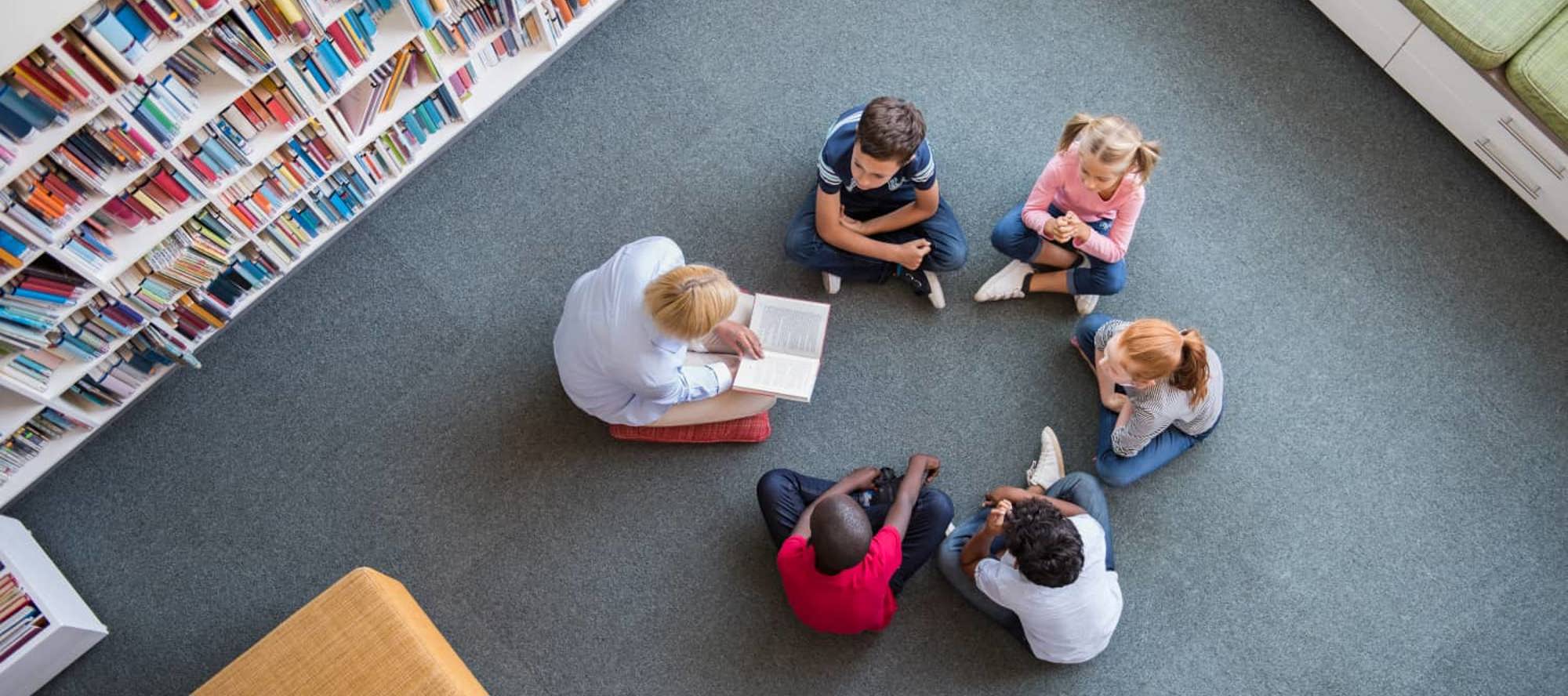 children being read a story